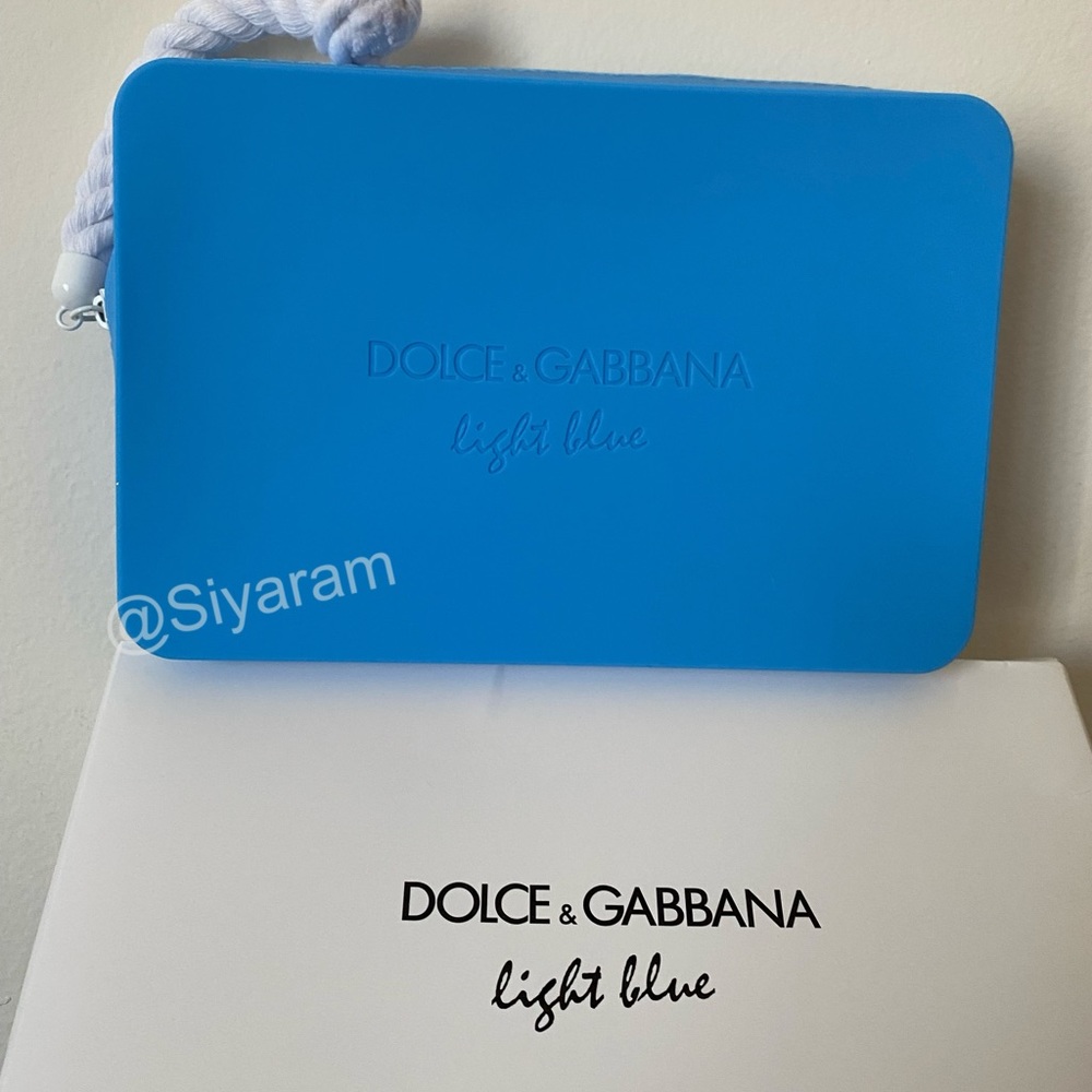 Dolce and Gabbana light blue toiletries case/ purse/ pouch